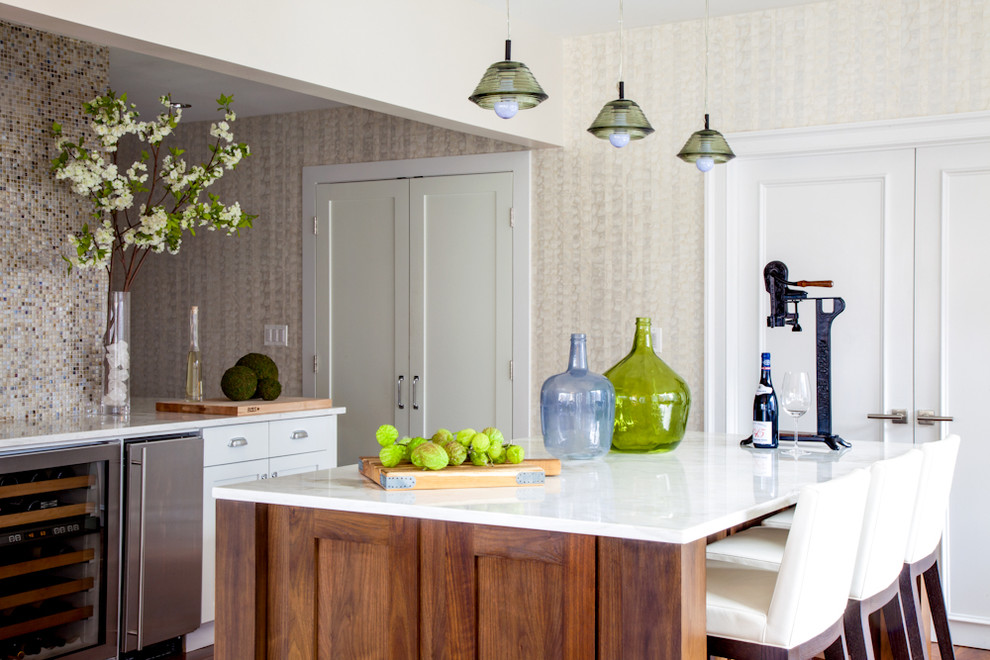 This is an example of an eclectic kitchen in New York with mosaic tile splashback and multi-coloured splashback.