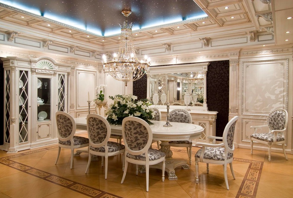 This is an example of a large traditional separate dining room in Valencia with white walls.