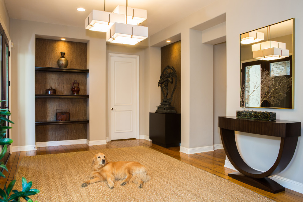 Example of a mid-sized transitional foyer design in Orange County