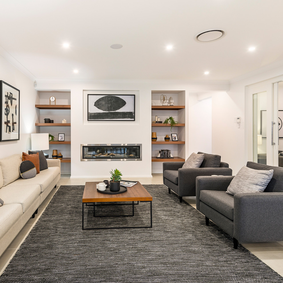 Large contemporary formal living room in Canberra - Queanbeyan with white walls, a metal fireplace surround, beige floor, a ribbon fireplace and no tv.
