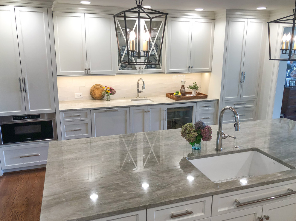 Transitional kitchen in Other with quartzite benchtops and grey benchtop.