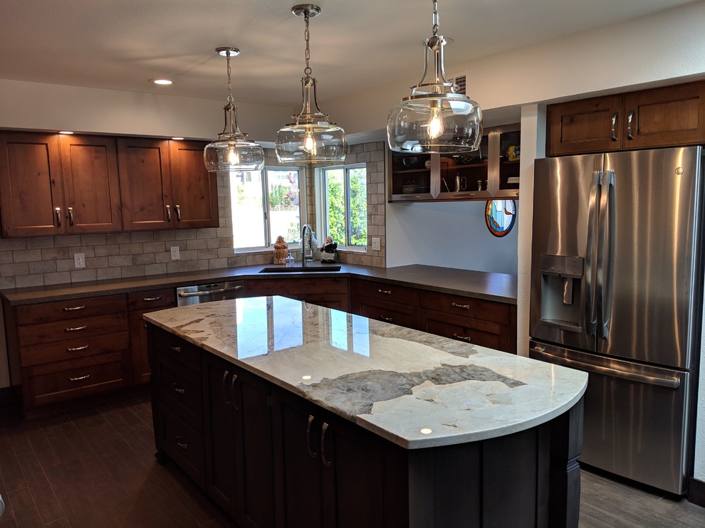 Inspiration for a mid-sized craftsman u-shaped porcelain tile kitchen remodel in Phoenix with an undermount sink and recessed-panel cabinets