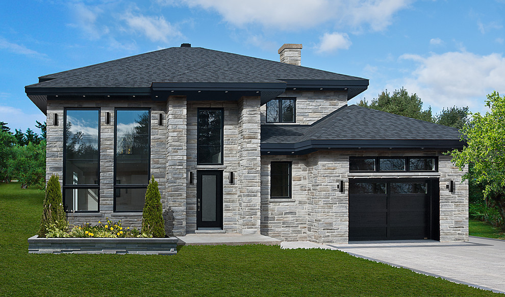 Contemporary grey exterior in Montreal with stone veneer.