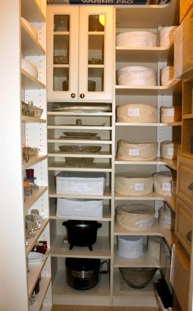 Inspiration for a transitional kitchen pantry remodel in Austin