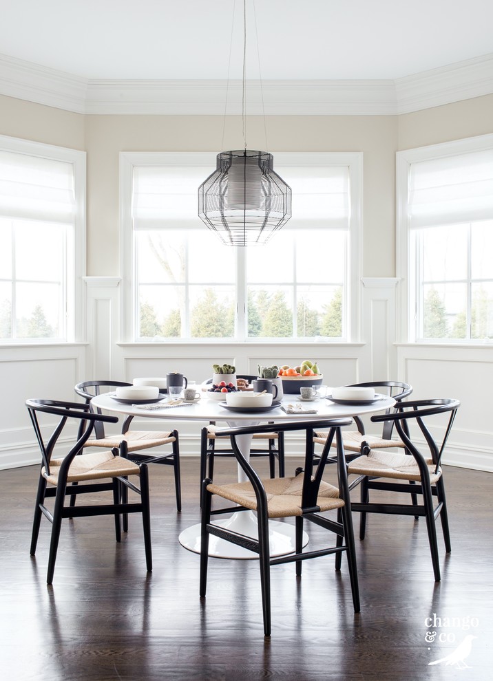 Inspiration for an expansive transitional open plan dining in New York with dark hardwood floors and brown floor.