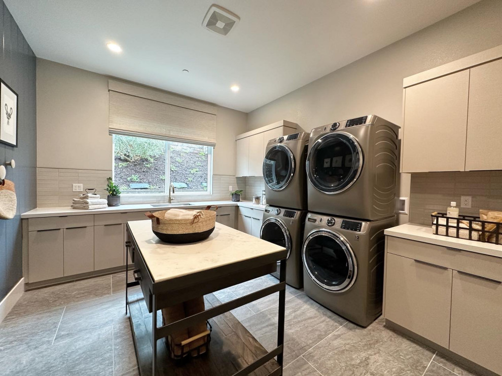 This is an example of a transitional laundry room in Orange County.