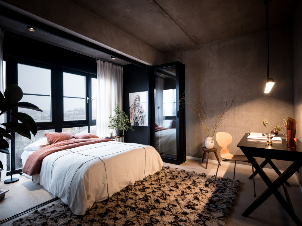 Inspiration for an industrial bedroom in Gothenburg.