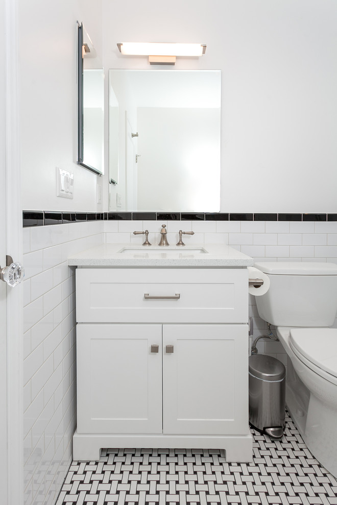 Mid-sized contemporary 3/4 bathroom in Los Angeles with beaded inset cabinets, white cabinets, an alcove shower, a one-piece toilet, white tile, subway tile, white walls, ceramic floors, a drop-in sink, granite benchtops, white floor, a sliding shower screen and white benchtops.