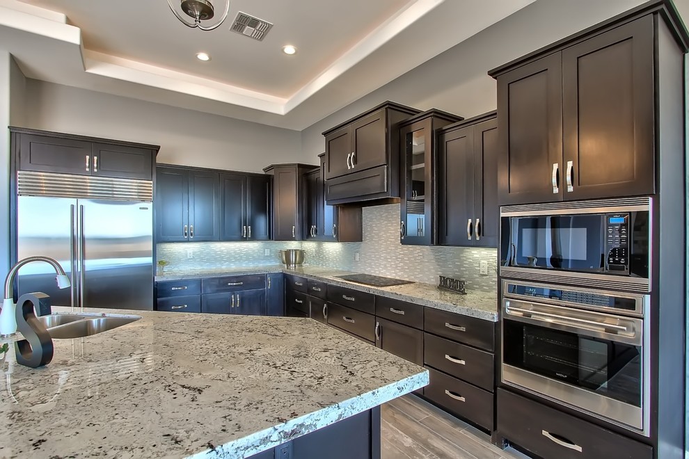 Inspiration for a transitional kitchen remodel in Phoenix with an island
