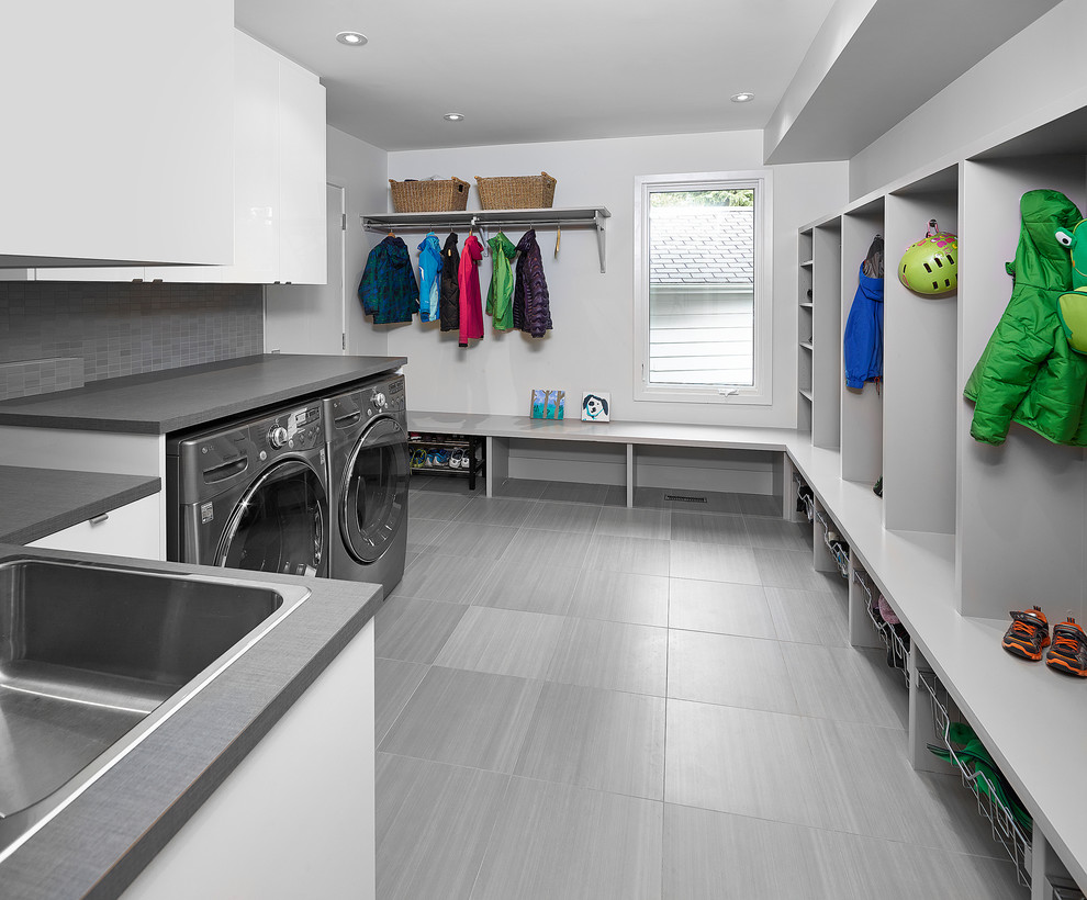 Photo of a contemporary laundry room in Edmonton.