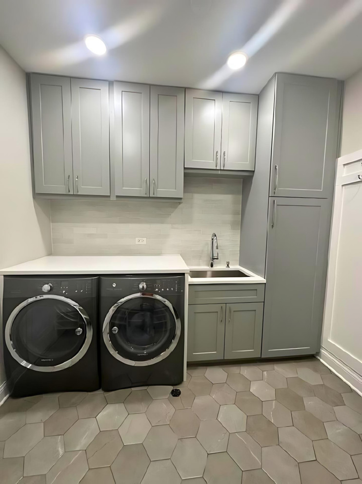 Utility room - small modern utility room idea in Chicago with shaker cabinets, gray cabinets, a side-by-side washer/dryer and white countertops