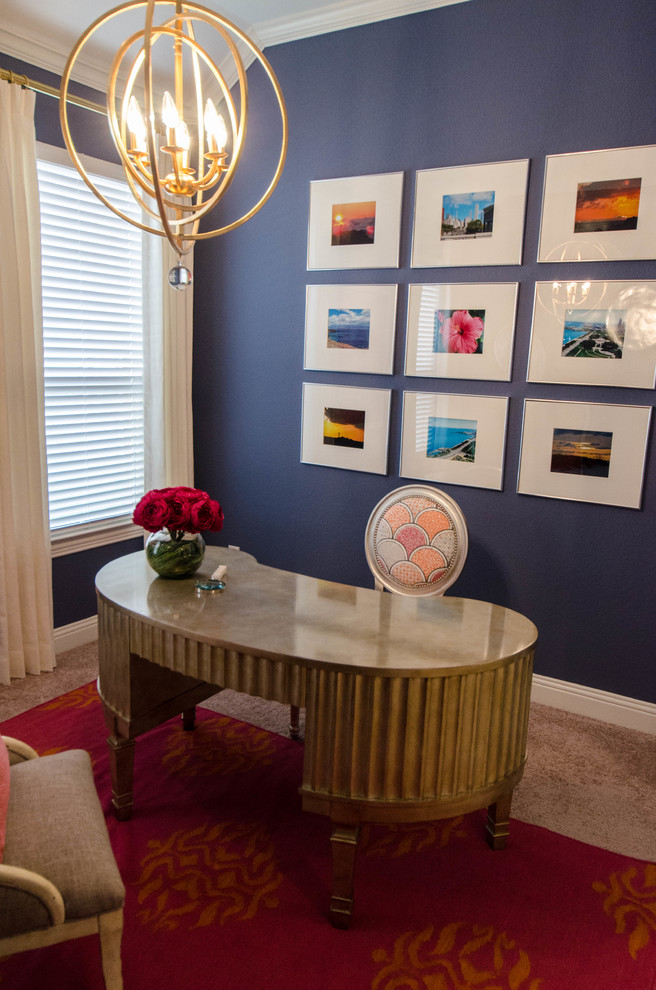 Small eclectic study room in Dallas with blue walls, carpet, a freestanding desk and beige floor.
