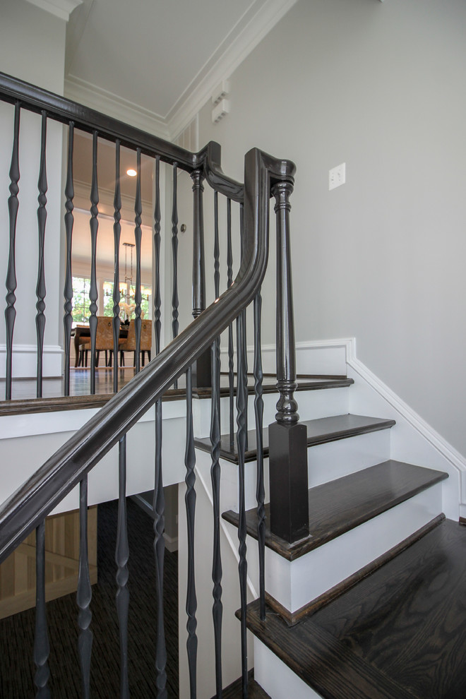 Staircase - large transitional wooden l-shaped mixed material railing staircase idea in DC Metro with painted risers