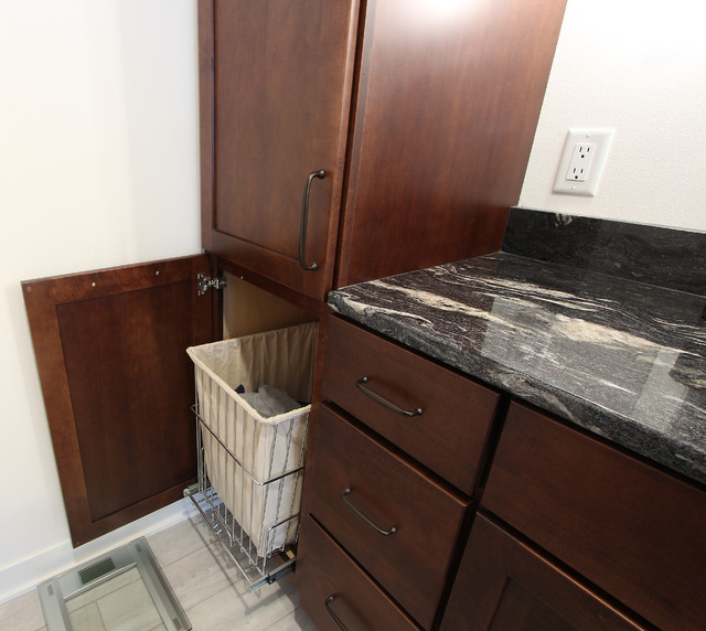 Pullout Hamper In Master Bathroom Vanity With Dark Stained