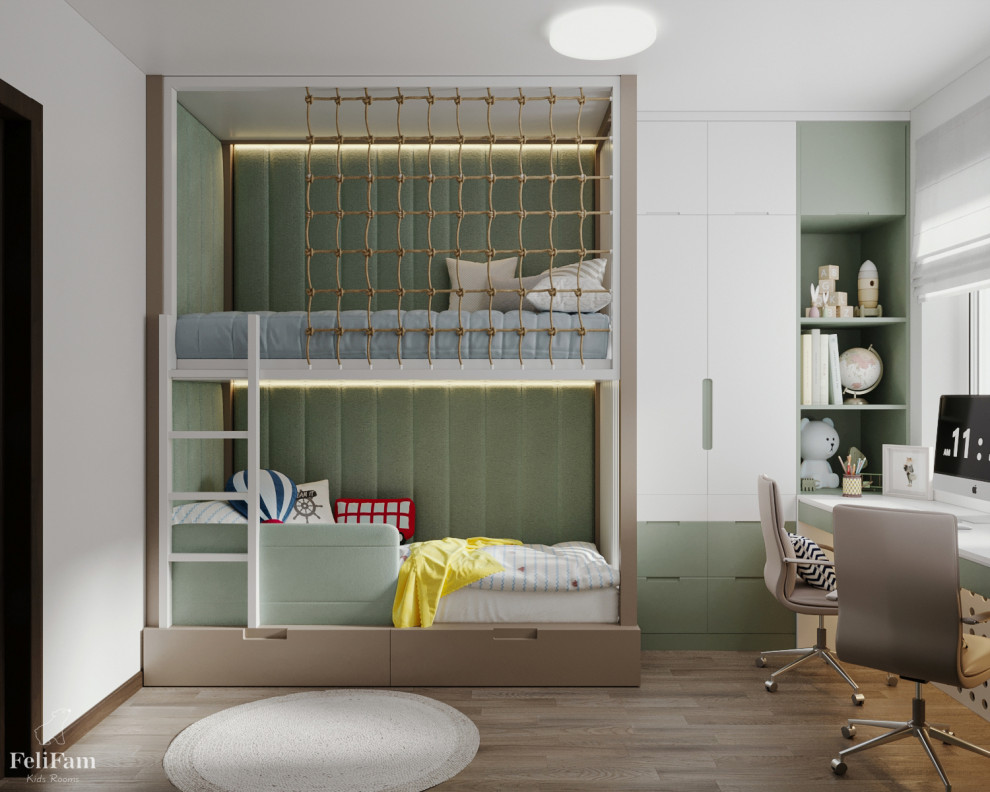Inspiration for a small children’s room for boys in Melbourne with beige walls, laminate floors and brown floors.