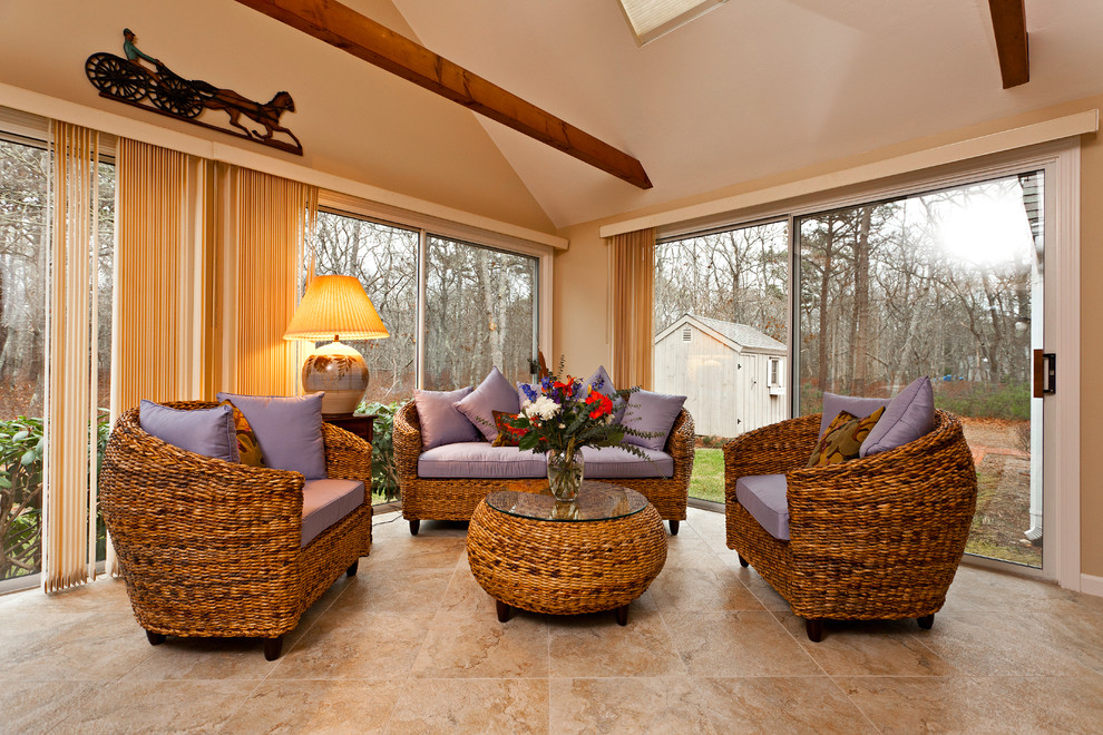 Photo of a mid-sized traditional sunroom in Boston with porcelain floors and a skylight.