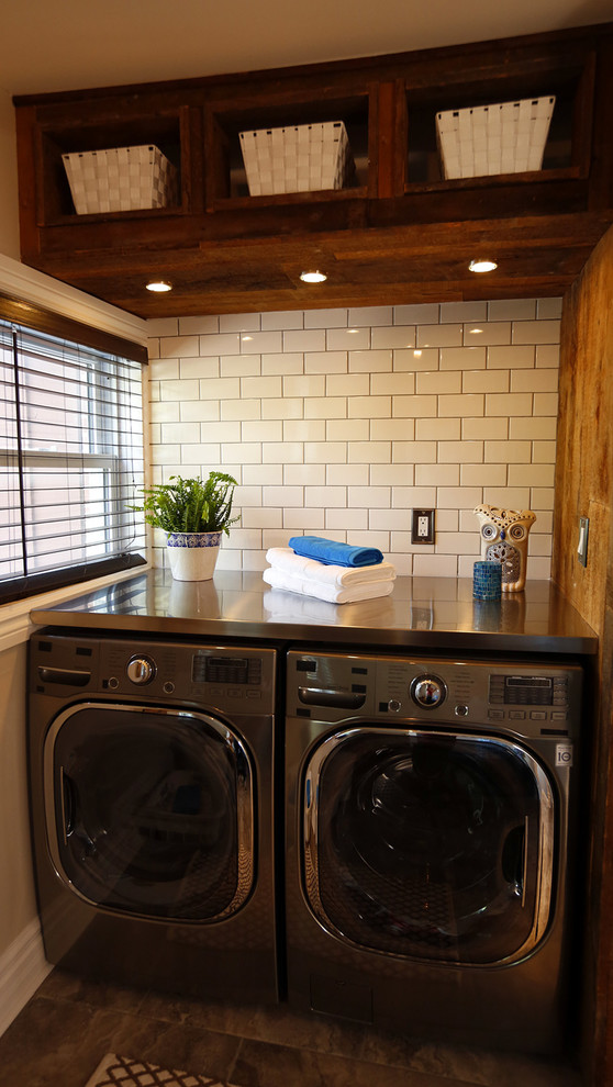 Example of a small transitional ceramic tile mudroom design in Toronto with beige walls