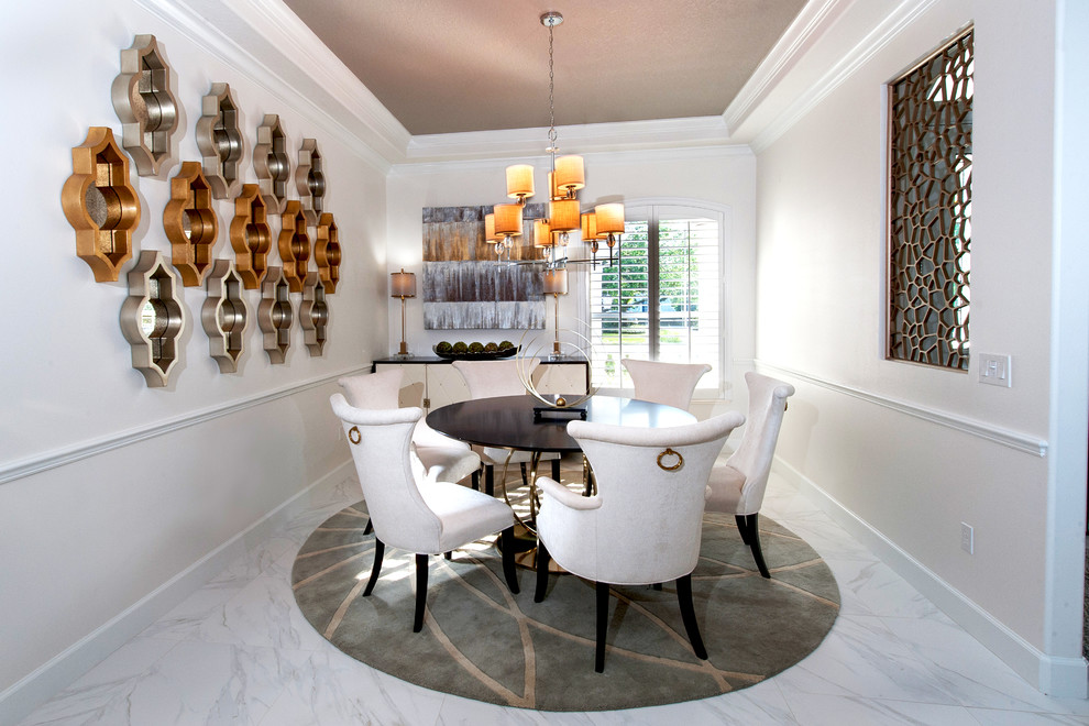 This is an example of a mid-sized transitional open plan dining in Orlando with white walls and porcelain floors.