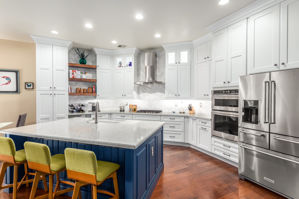Inspiration for a transitional kitchen remodel in Phoenix with a farmhouse sink, shaker cabinets, white cabinets, white backsplash, subway tile backsplash and white countertops