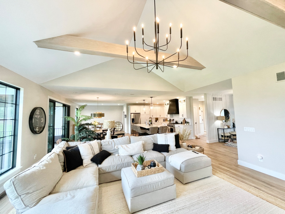 White, Black, and White Oak Open Concept Kitchen and Pantry in