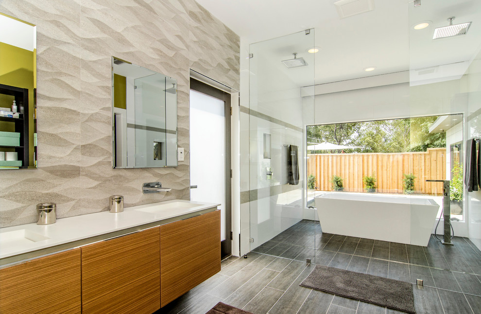 Design ideas for a contemporary bathroom in Dallas with a curbless shower and a freestanding tub.