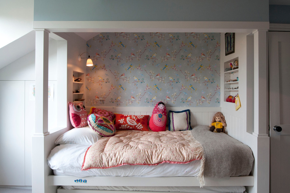 Photo of a traditional kids' bedroom for girls in London with multi-coloured walls.