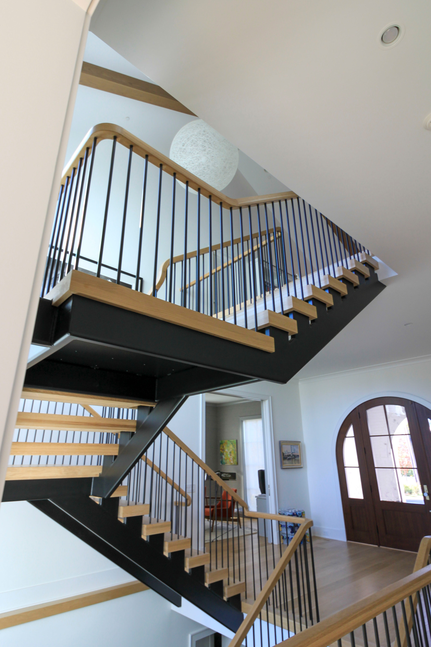 96_Dramatic cantilevered no-riser staircase, Bethesda, MD 20814