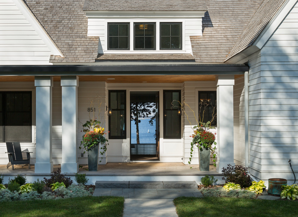 Mid-sized modern front door in Minneapolis with a single front door and a dark wood front door.