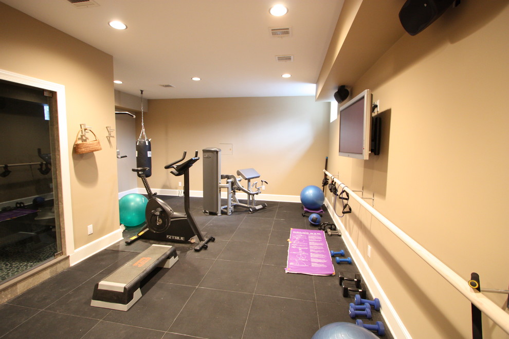 Inspiration for a transitional home gym in New York with beige walls.