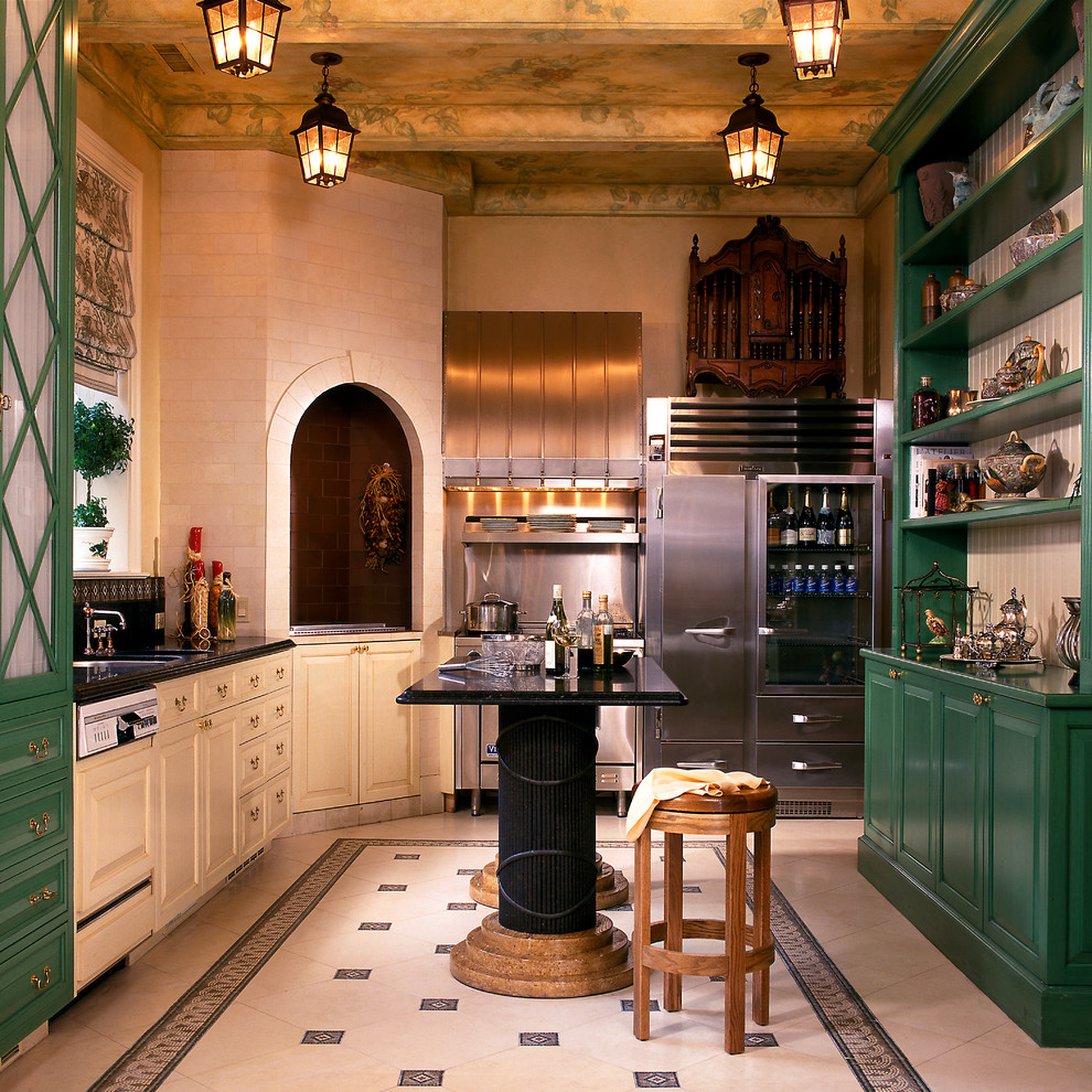 This is an example of a large eclectic galley separate kitchen in Chicago with metal splashback, metallic splashback, raised-panel cabinets, green cabinets, stainless steel appliances, an undermount sink, marble benchtops, ceramic floors and with island.
