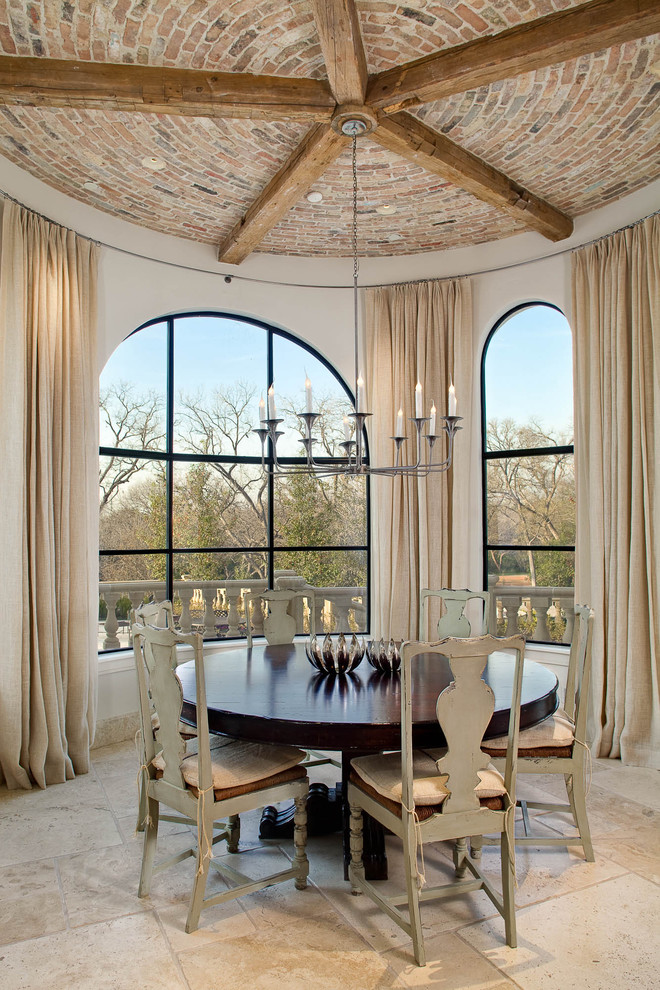 Inspiration for a traditional dining room in Dallas with white walls.