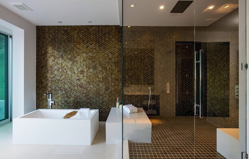 Inspiration for an expansive modern master wet room bathroom in Los Angeles with flat-panel cabinets, a freestanding tub, a one-piece toilet, brown tile, porcelain tile, white walls and porcelain floors.