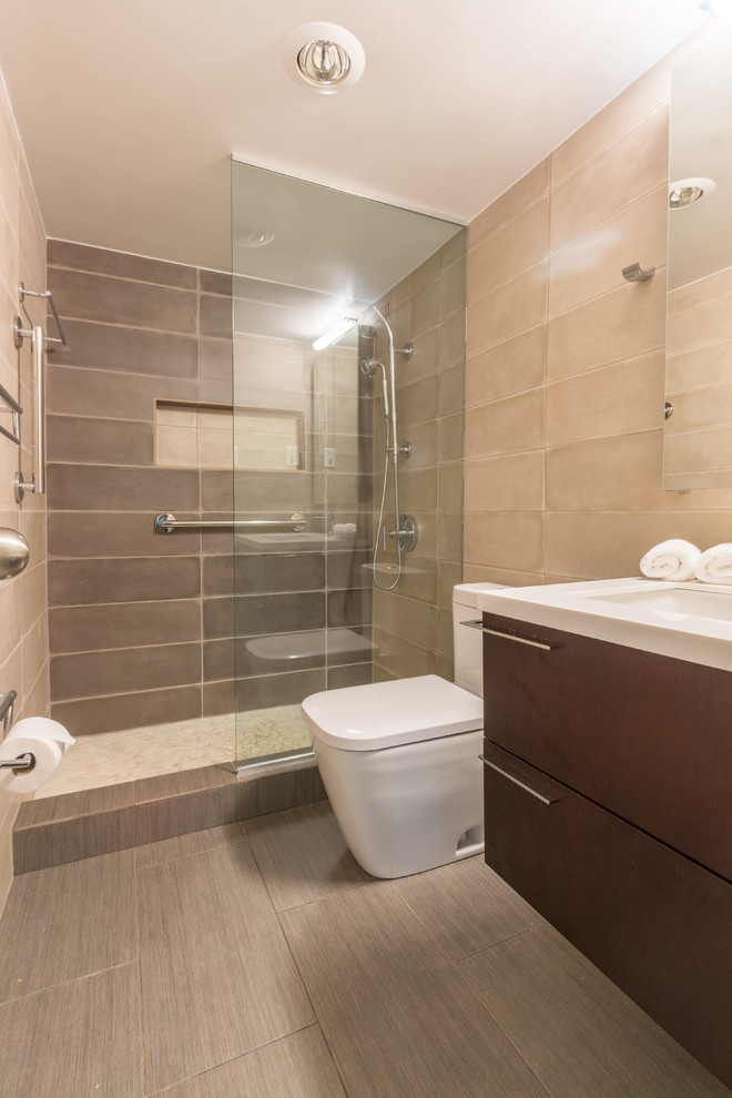 Small modern 3/4 bathroom in DC Metro with louvered cabinets, dark wood cabinets, an open shower, a one-piece toilet, ceramic tile, beige walls, ceramic floors, an undermount sink and quartzite benchtops.
