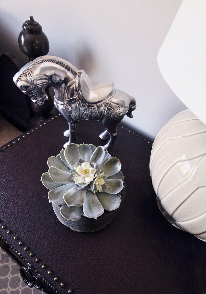Traditional Rumson Home - A leather chest is embellished with satin nickel nail-heads for a masculine feel.