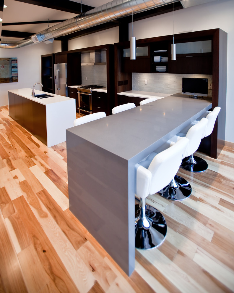 This is an example of a contemporary kitchen in Minneapolis with stainless steel appliances.
