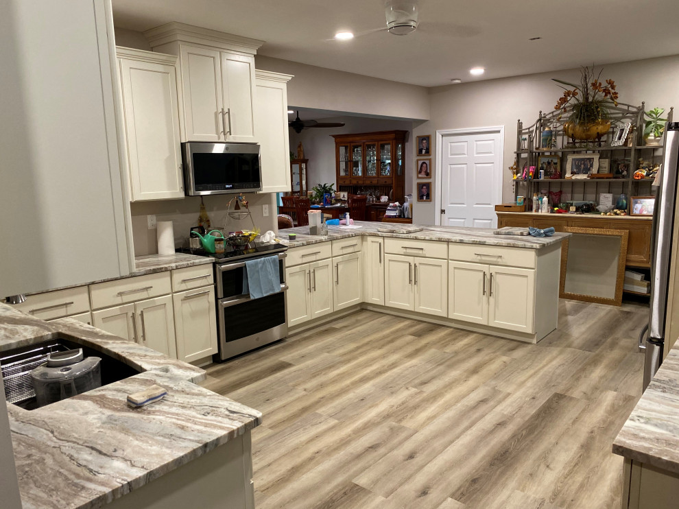 Example of a transitional kitchen design in Miami