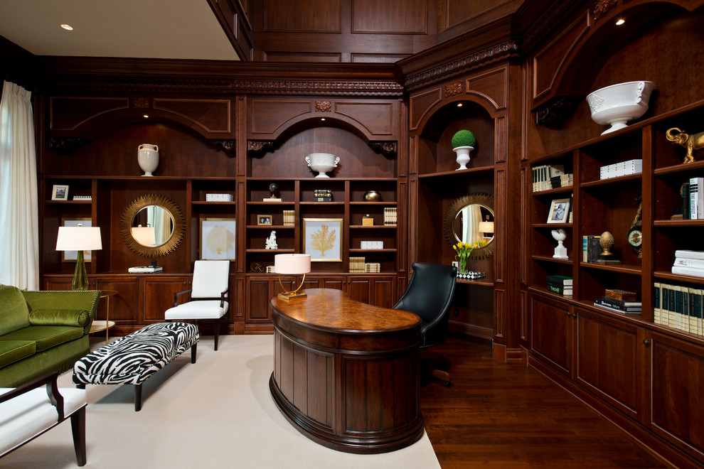 Large traditional study room in Miami with dark hardwood floors and a freestanding desk.