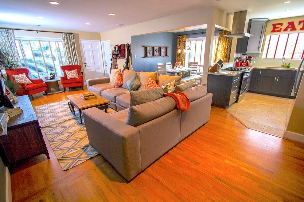 Photo of a mid-sized traditional living room in San Diego with beige walls and medium hardwood floors.