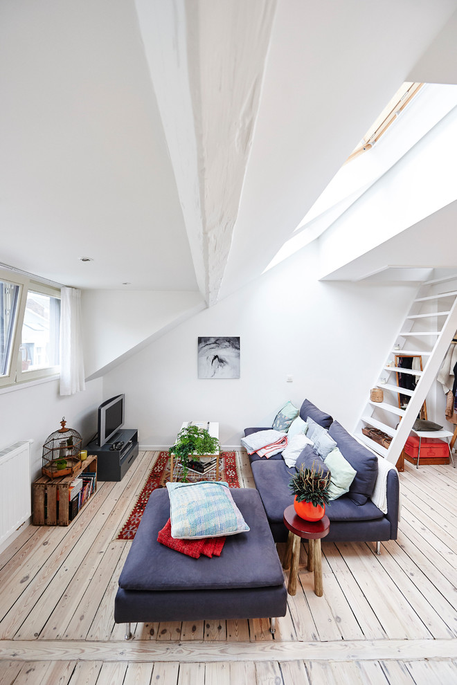 Photo of a scandinavian family room in Brussels.