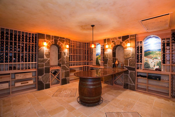 Stone arch and Granite tasting table - Traditional - Wine Cellar
