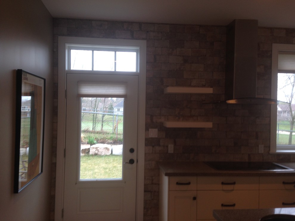 Example of a mountain style single-wall kitchen design in Toronto