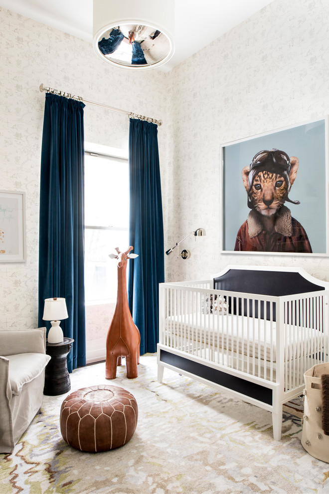 Photo of a transitional gender-neutral nursery in New York with white walls.