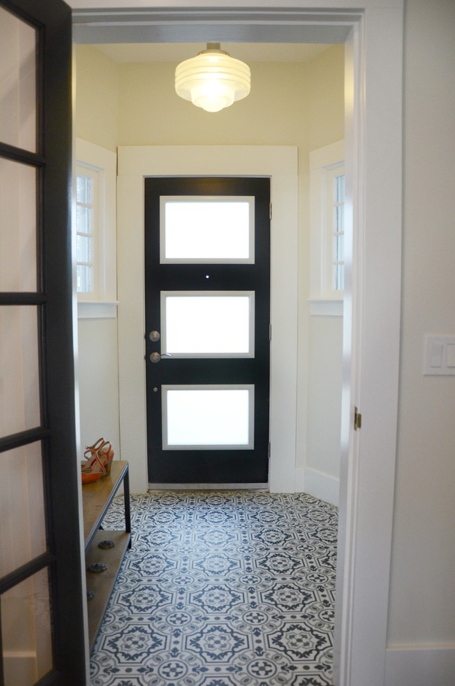 Inspiration for a transitional entryway remodel in Calgary