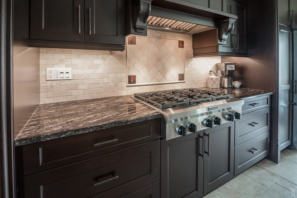 Example of a transitional kitchen design in Toronto