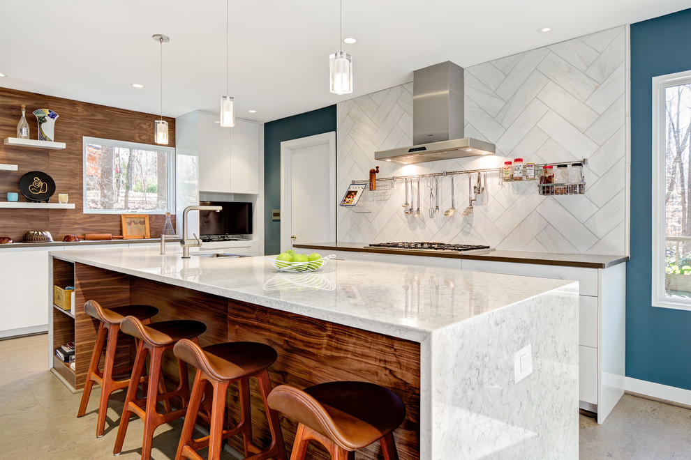 Mid-sized contemporary l-shaped separate kitchen in Other with a farmhouse sink, flat-panel cabinets, white cabinets, quartz benchtops, white splashback, stone tile splashback, stainless steel appliances, cork floors, with island and beige floor.