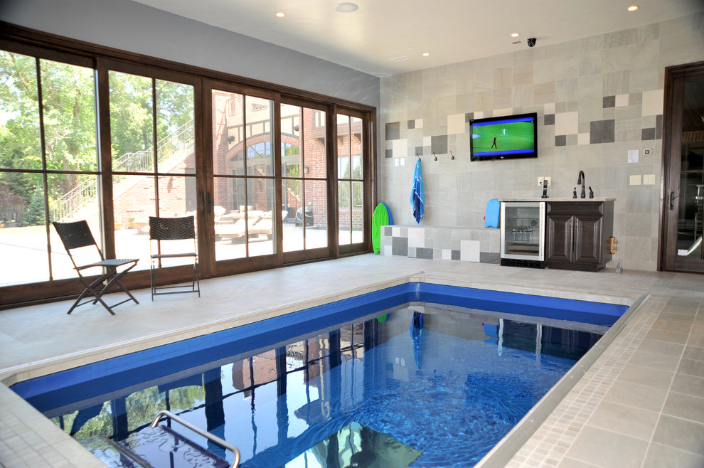 Inspiration for a traditional indoor pool in Denver.