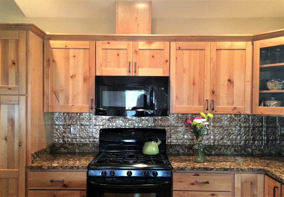 Inspiration for a mid-sized rustic l-shaped eat-in kitchen remodel in Phoenix with shaker cabinets and an island