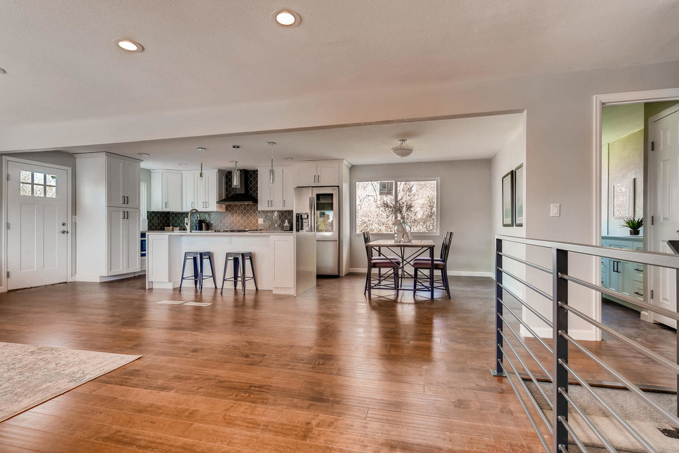 Example of a transitional kitchen design in Denver