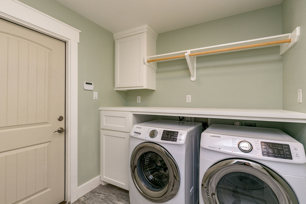 Example of a transitional laundry room design in Austin