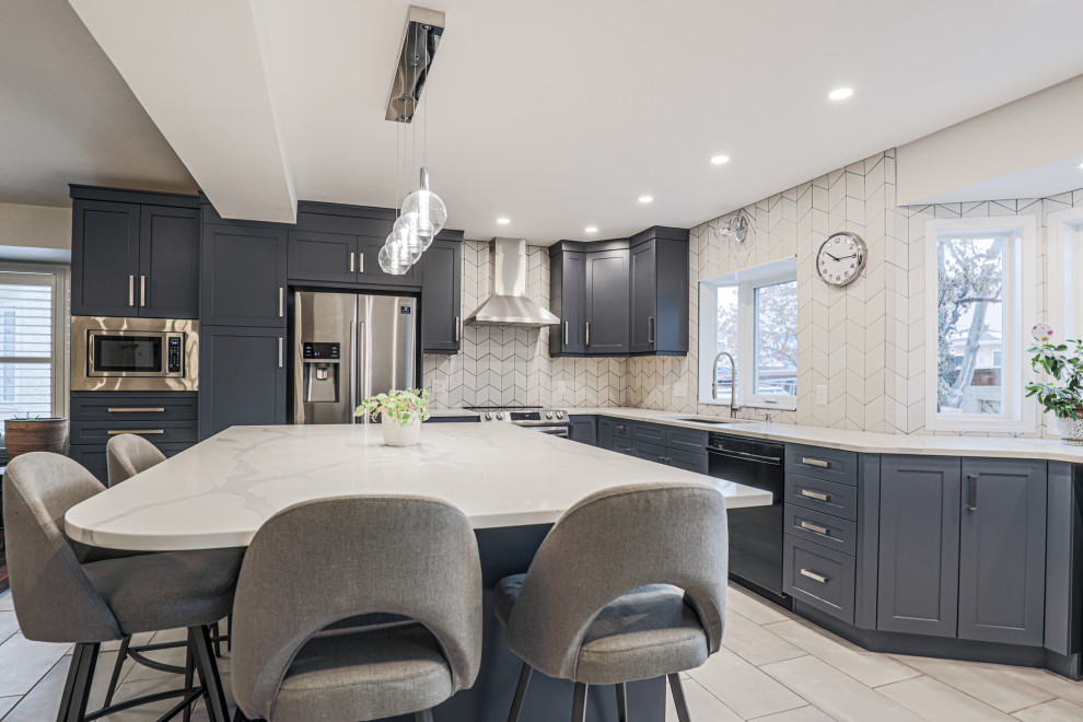 Transitional home design photo in Edmonton